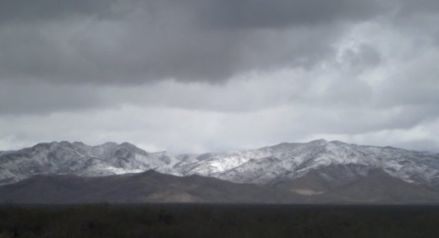 In spite of the clouds, there's enough solar power in the batteries to run the television, laptop, and lights.
