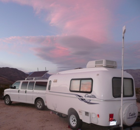 Our home below pink clouds