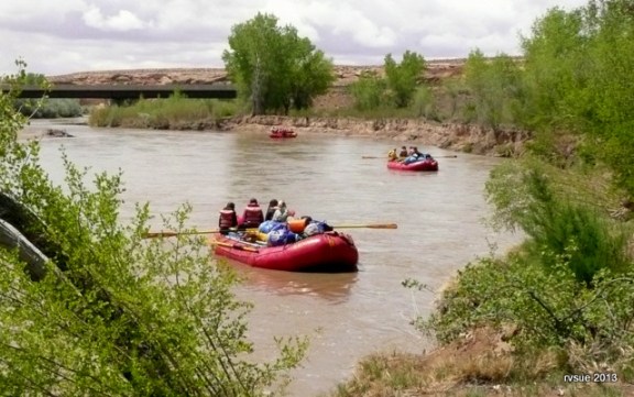 Further downstream toward the bridge and soon out of sight . . .